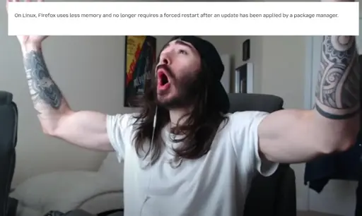 Charlie/penguinz0 doing a celebratory pose with a section of the Firefox release notes reading: "On Linux, Firefox uses less memory and no longer requires a forced restart after an update has been applied by a package manager."